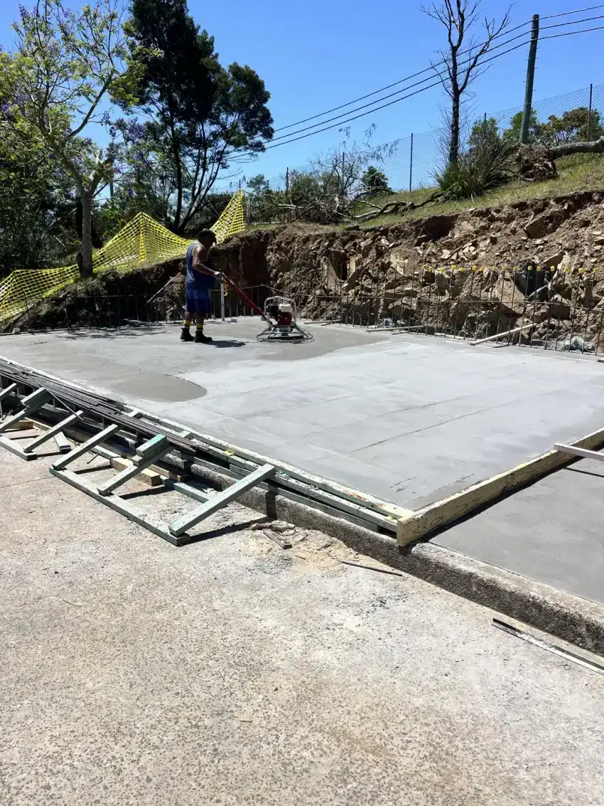 Steel reinforcement and timber formwork set out and tied ready for a concrete pour.